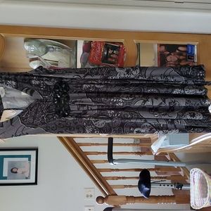 Black and white knee length dress with beaded waist